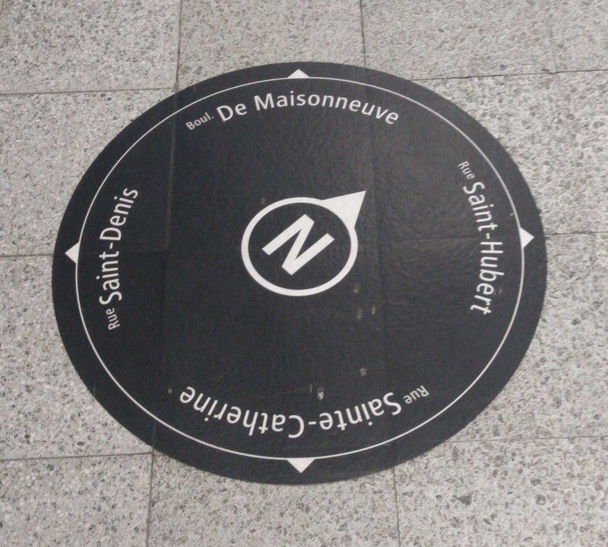 Montréal Métro station exit compass sticker at Berri-UQAM